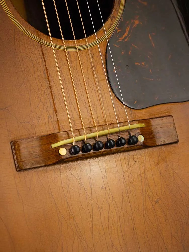 1945 Gibson J-45 acoustic guitar bridge and soundhole