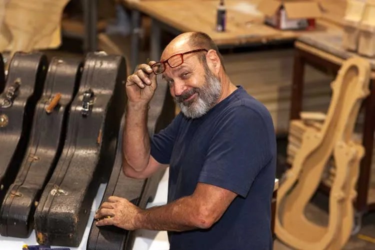 bill collings with guitar cases