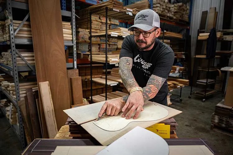 Steve Nall making a guitar in the Collings workshop