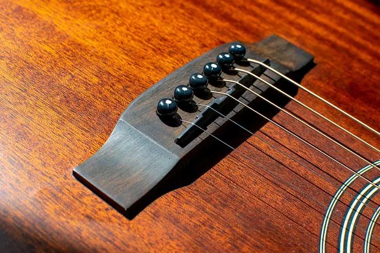 acoustic guitar saddle and bridge