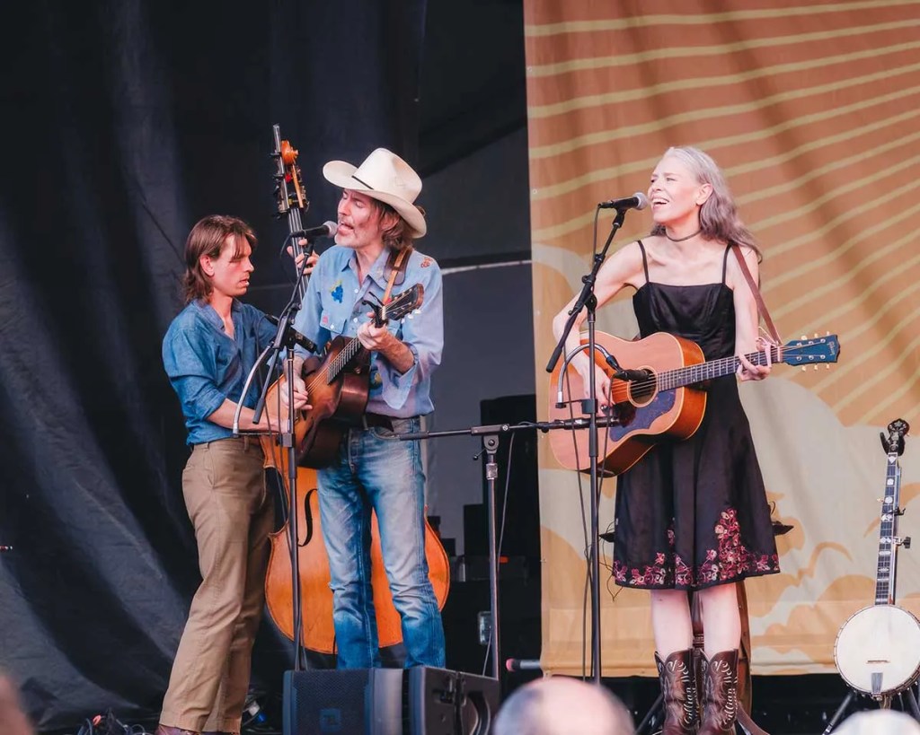 Rawlings and Welch with Paul Kowert on bass at the 2024 Newport Folk Festival. Photo:  Emilio Herce