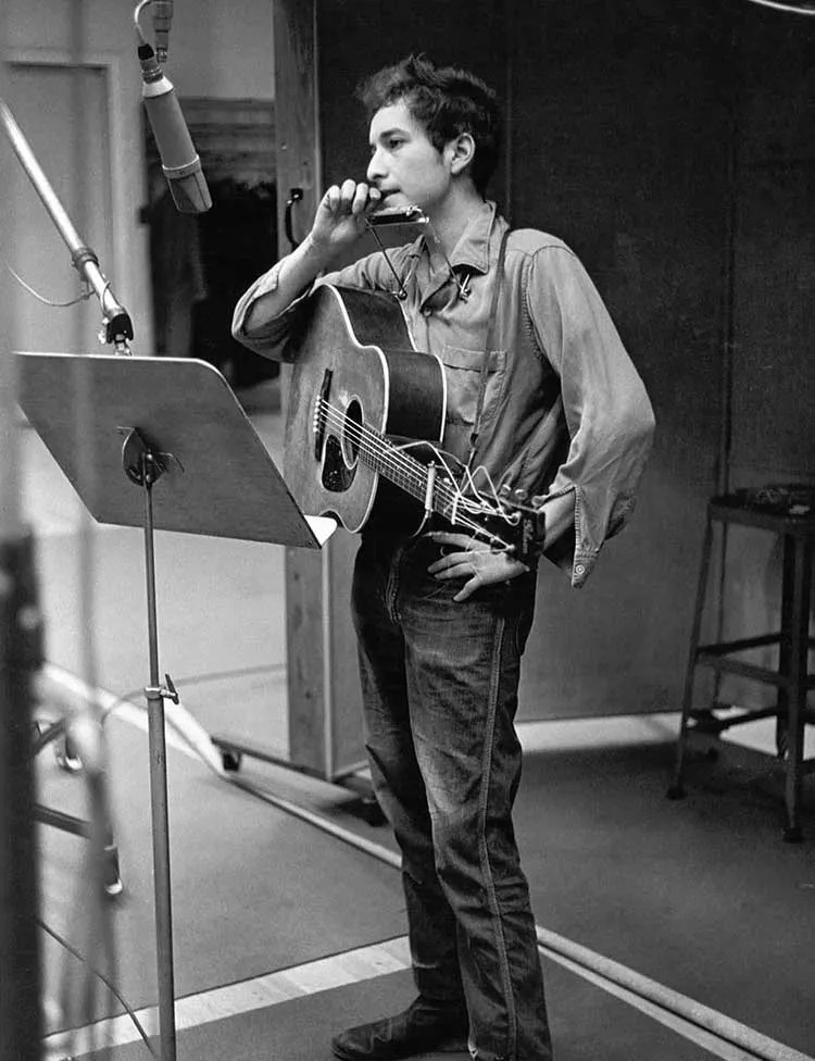 Bob Dylan between takes in the recording studio.