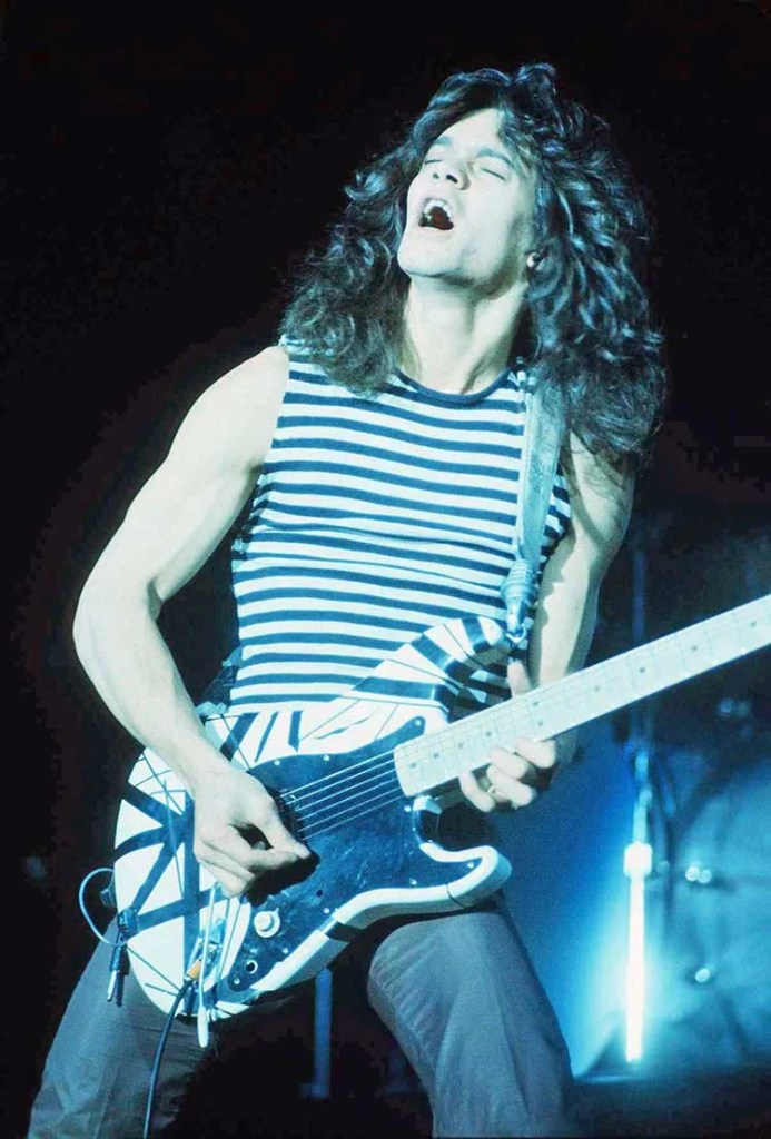 Eddie Van Halen playing electric guitar