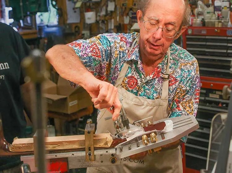 Frank Ford repairing guitar neck