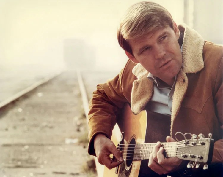 Glen Campbell with acoustic guitar