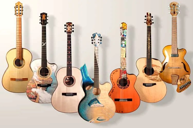 Group shot of all seven guitars built for the Group of Seven Guitar Project exhibition.