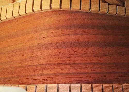 Close-up photo of an acoustic guitar’s interior kerfing