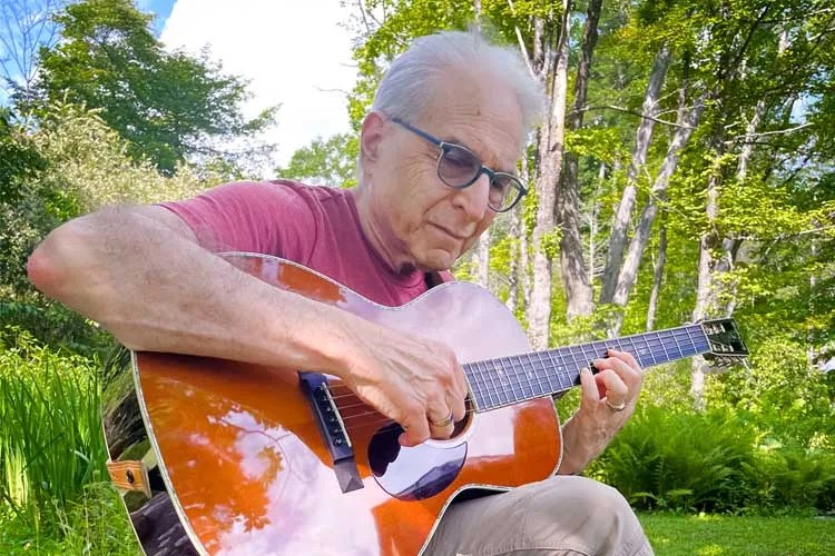 Happy Traum picking a Santa Cruz Guitar Company Happy Traum Signature Model HT/13 at his home in Woodstock, NY