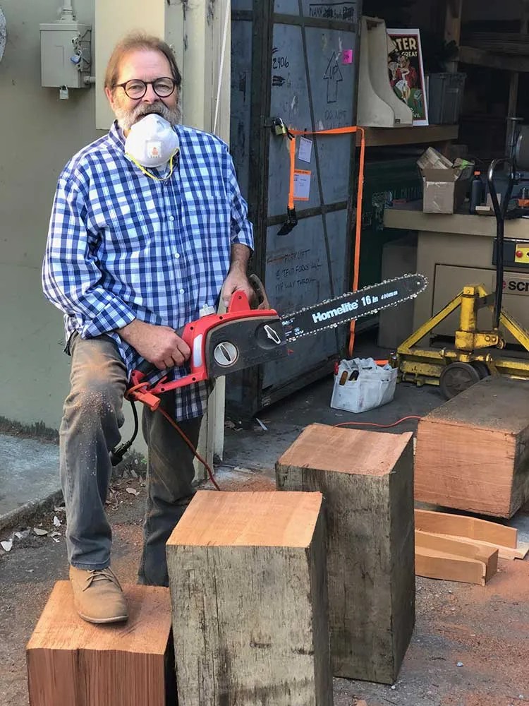 Richard Hoover cutting wood