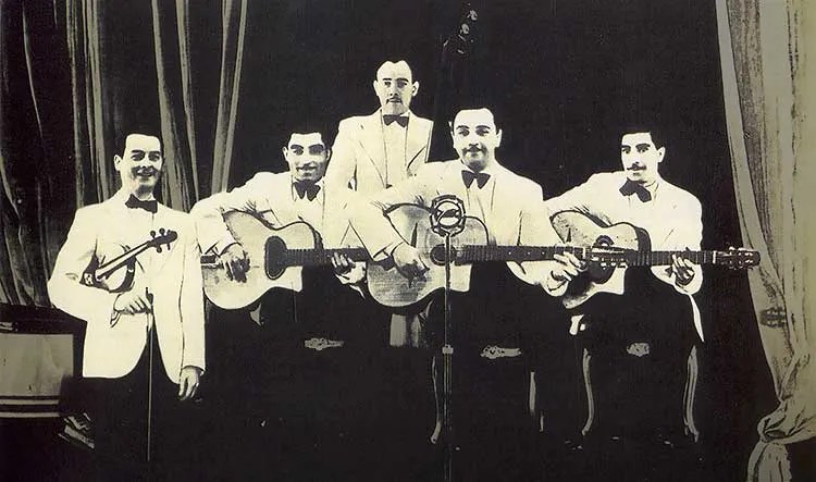 Quintette du Hot Club de France in 1939: (L-R) Stéphane Grappelli, Eugene Vees, Roger Grasset, Django Reinhardt, Joseph Reinhardt