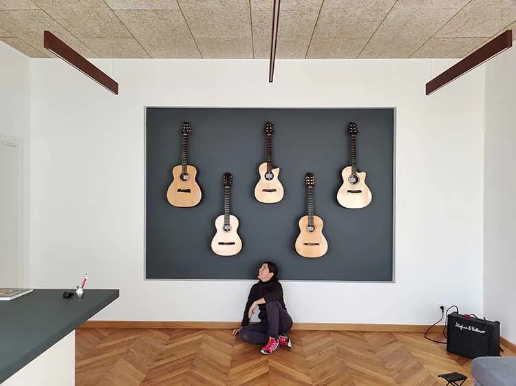 Luthier Noemi Schembri with guitars