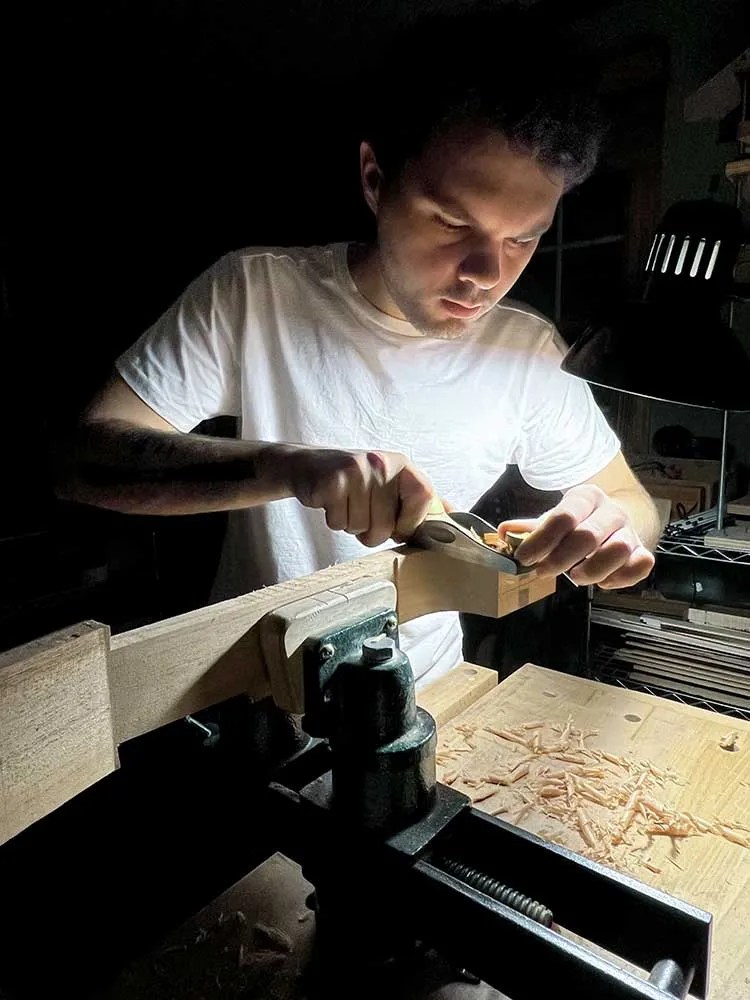 Luthier Brian Itzkin working on a guitar