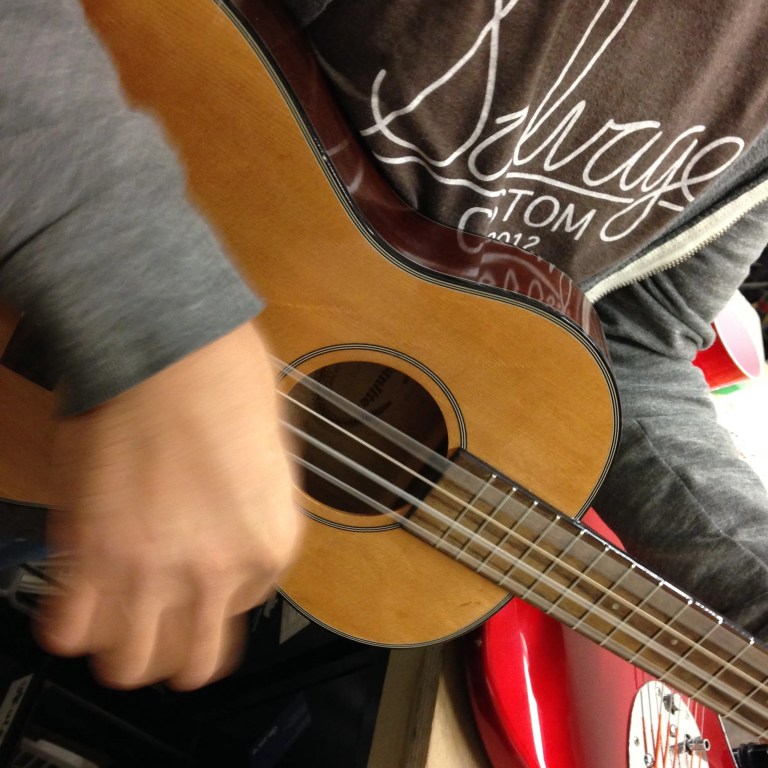 Gabriel Tenorio plays a small guitar strung with Guadalupe strings