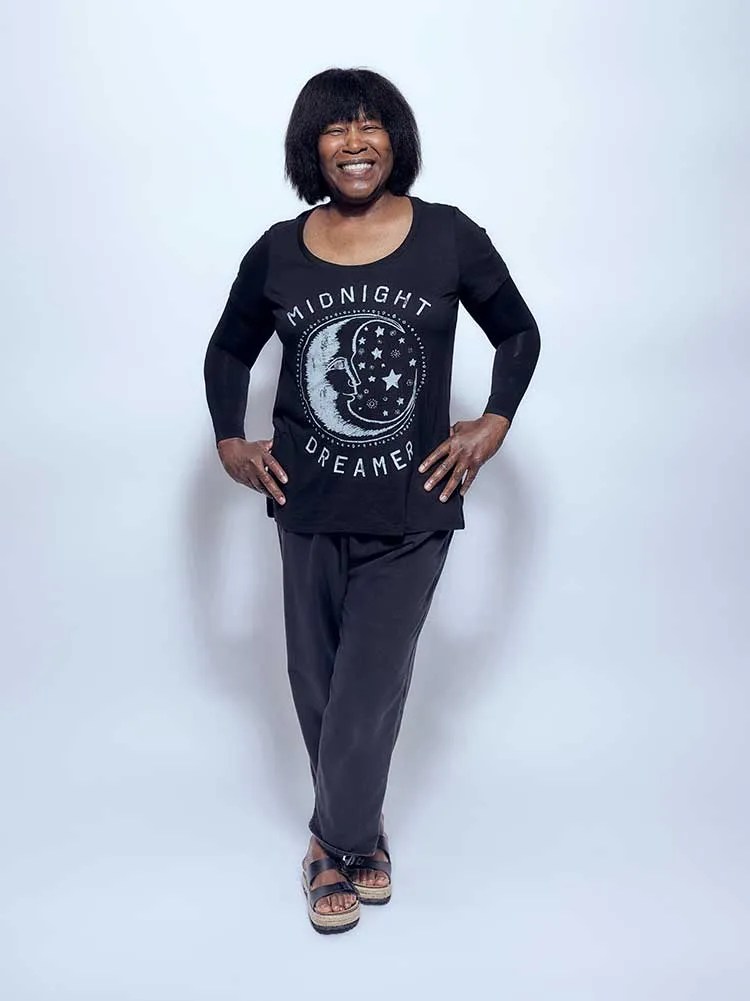 Joan Armatrading poses in a Midnight Dreamer shirt