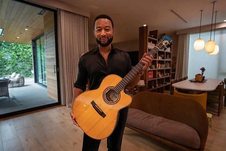 John Legend with Linda Manzer's Sunflower Guitar for Ukraine