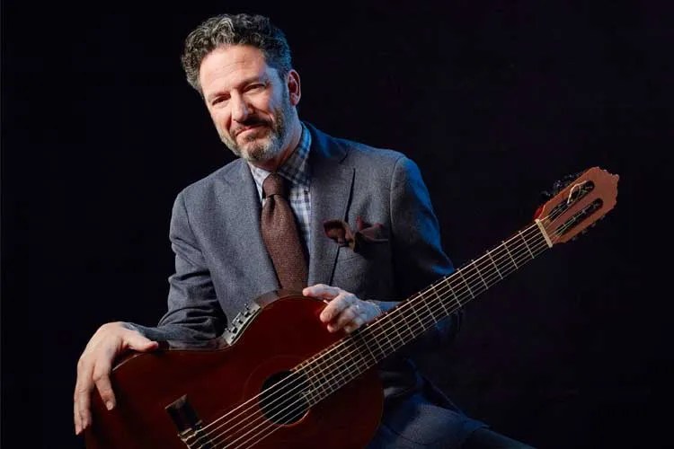 John Pizzarelli with acousticguitar