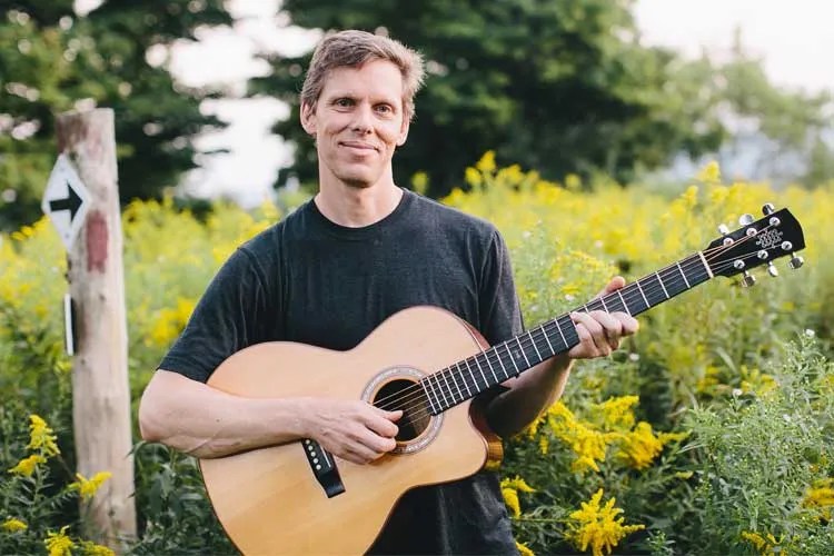 jeffrey pepper rodgers with acoustic guitar