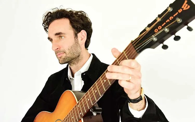 Julian Lage with guitar. Photo by Shervin Lainez