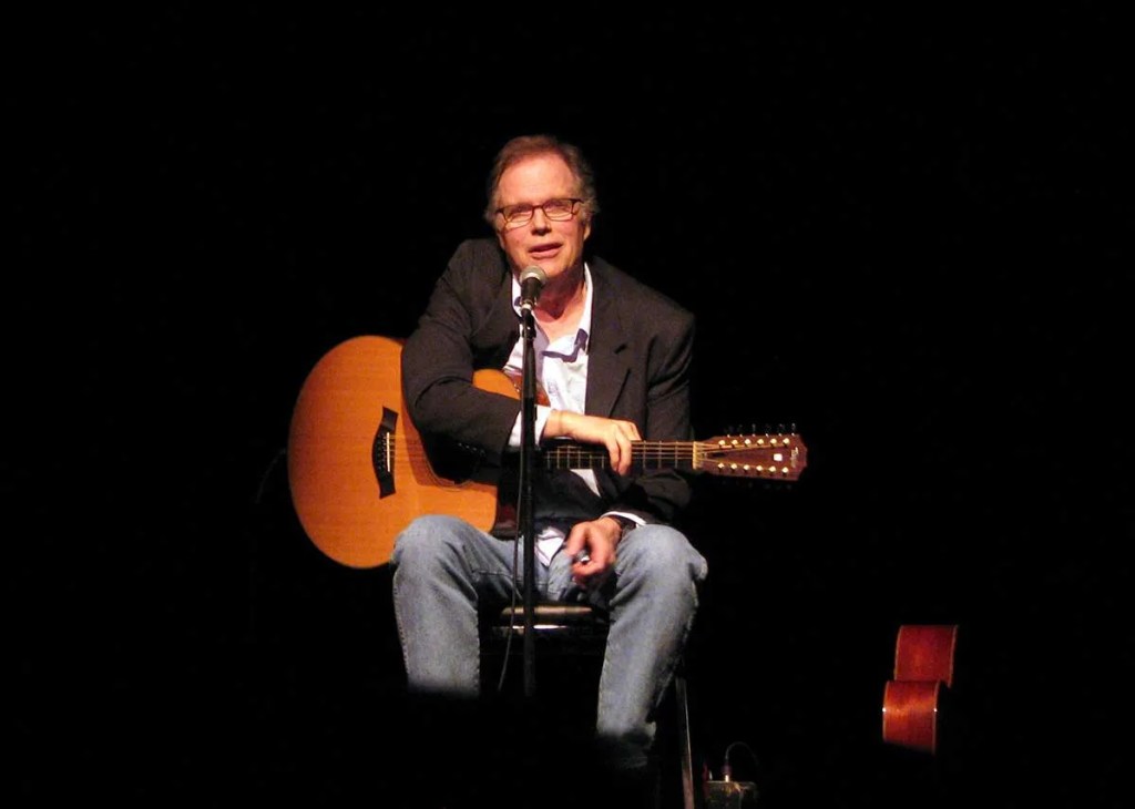 Leo Kottke onstage with guitar