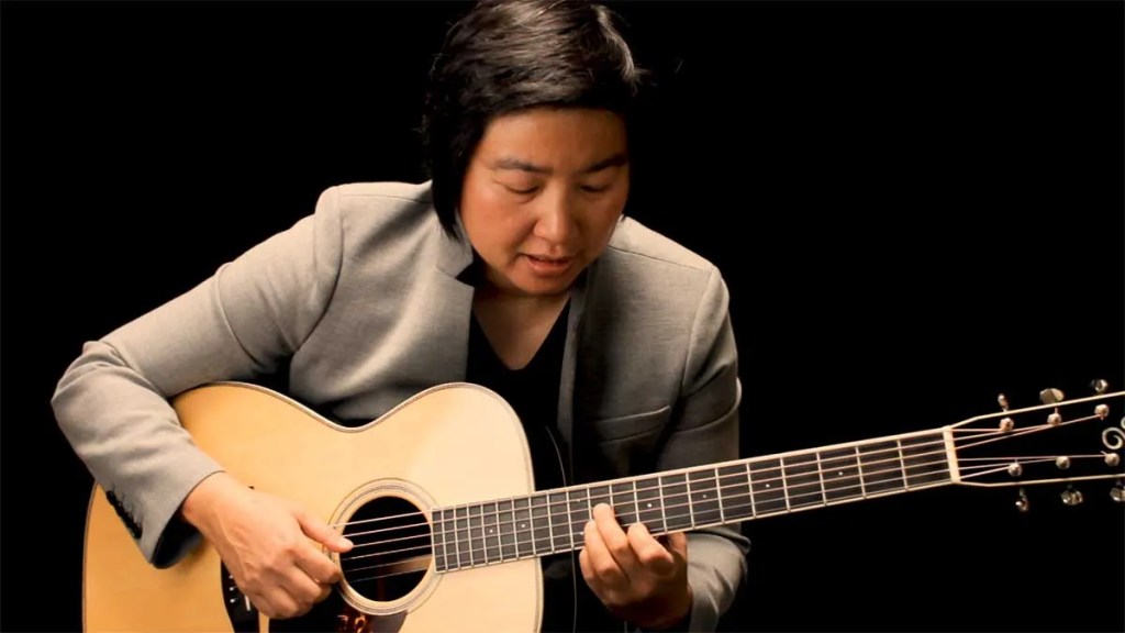 Lisa Liu playing Sweet Georgia Brown on acoustic guitar