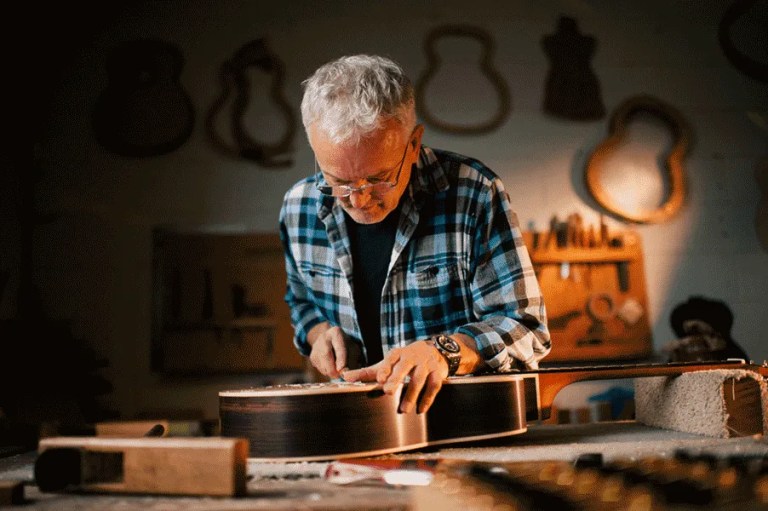 Guitar maker George Lowden in his shop.