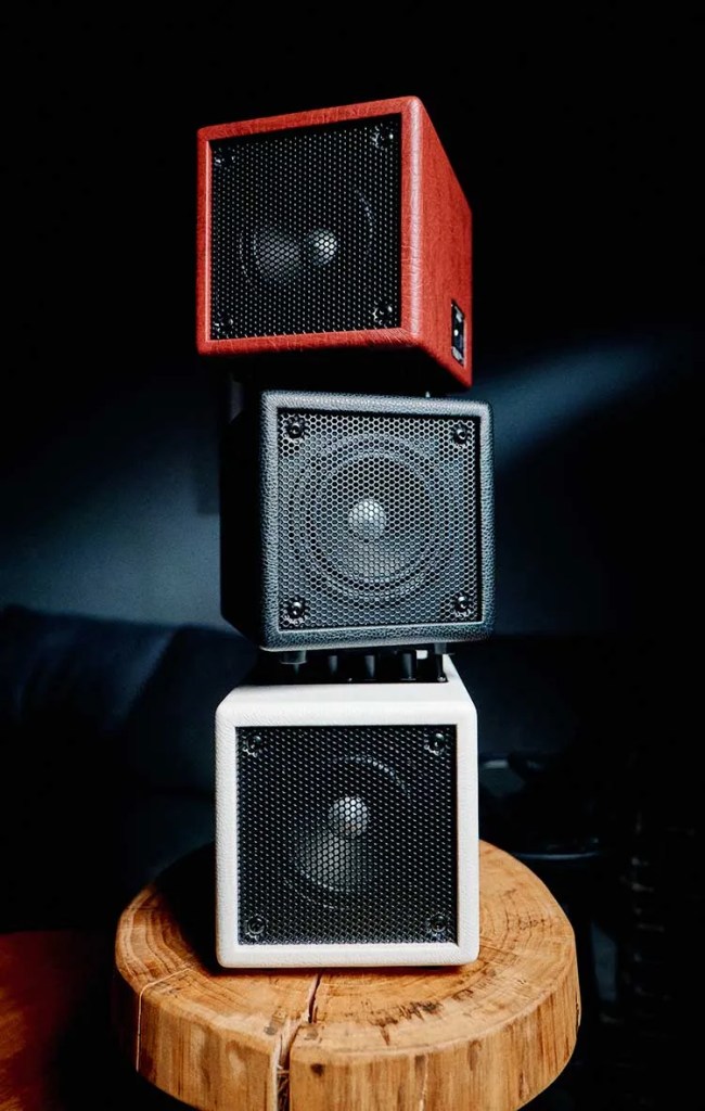 Phil Jones Bass X4 Nanobass combo amplifier in black, red, and white