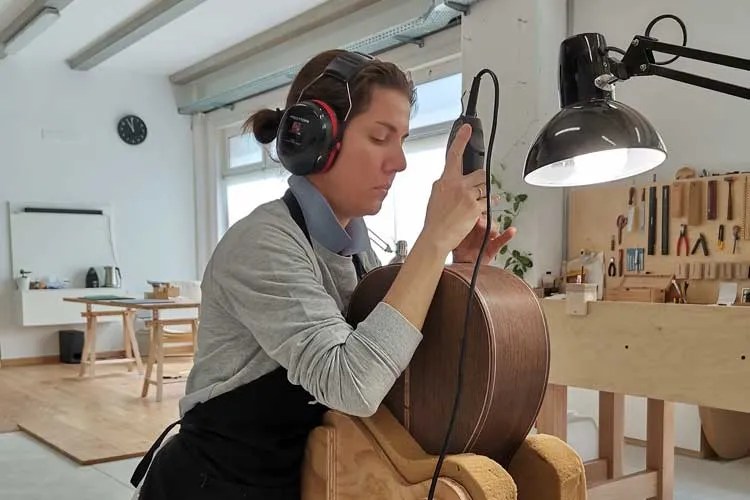 Noemi Schembri building an acoustic guitar