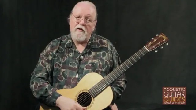 Orville Johnson demonstrating open g tuning on guitar