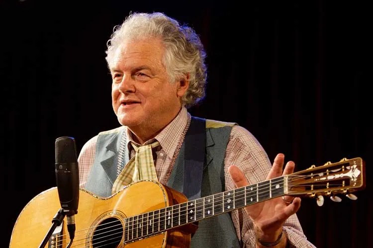 peter rowan with guitar onstage