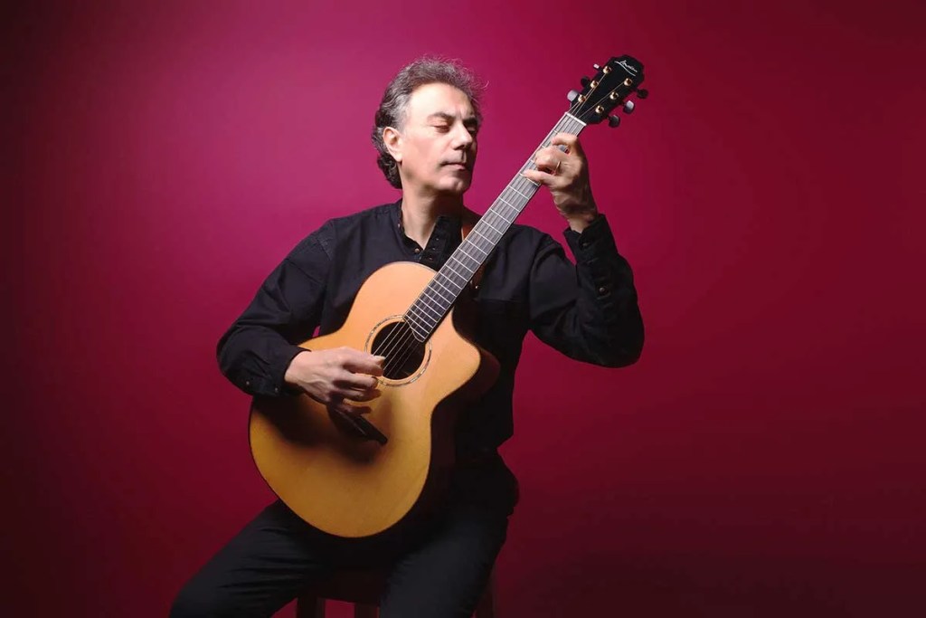 Pierre Bensusan playing guitar