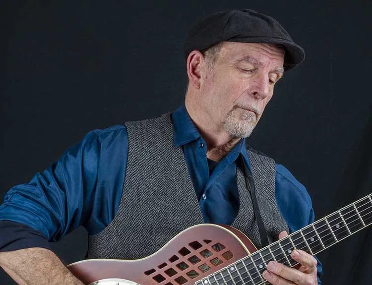 Steve James playing resonator guitar