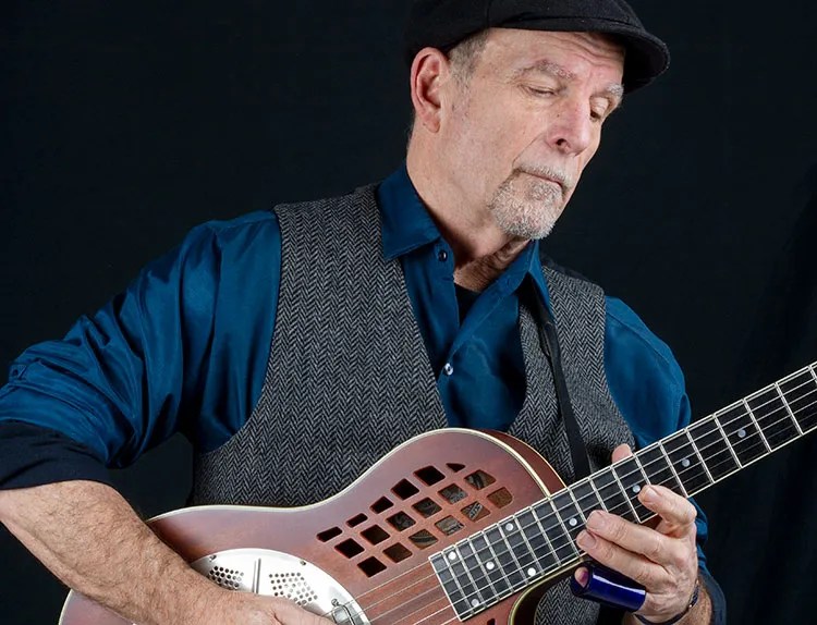 steve james playing acoustic guitar