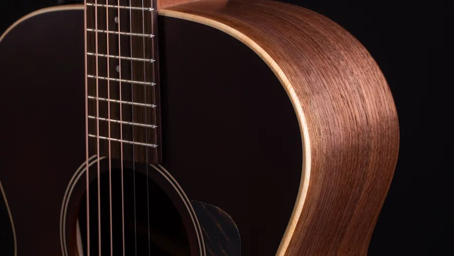 Detail of a Taylor AD12e-SB guitar