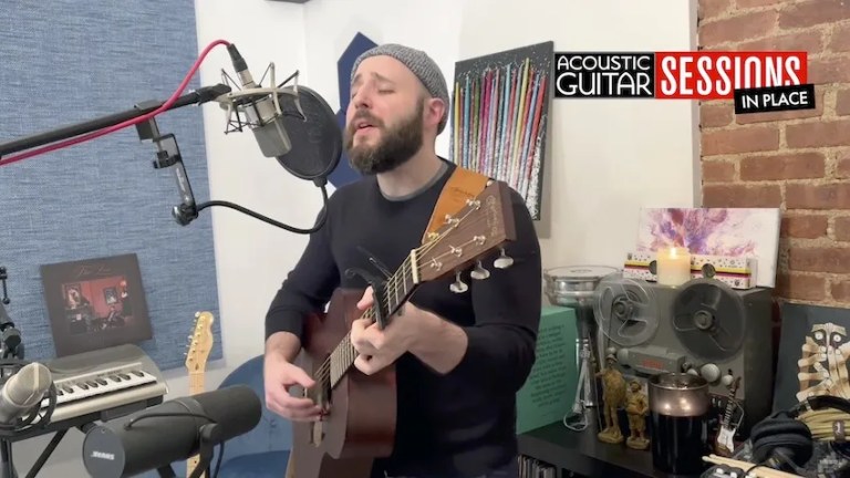 screenshot of singer-songwriter Thin Lear performing in his home studio