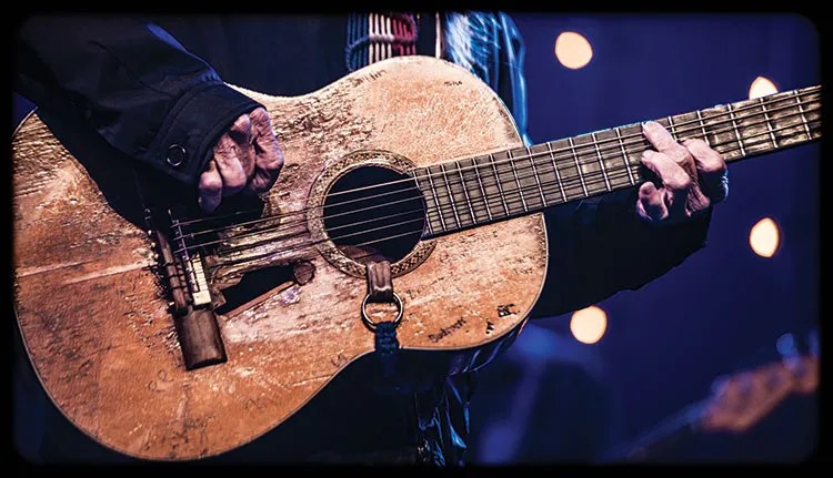 Willie Nelson's guitar for article about things steel-string guitar players should know about nylon string guitars