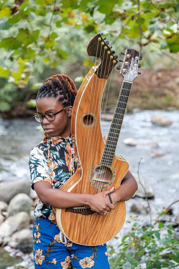 Yasmin Williams with harp guitar. Photo: Kim Atkins